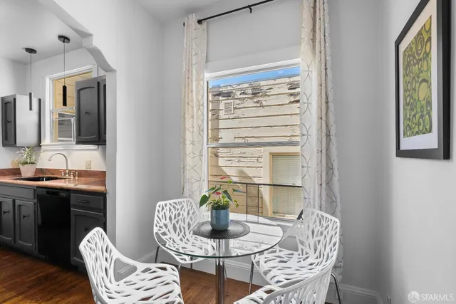 a bedroom with a bed and a table in it