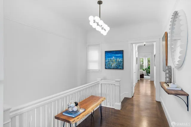 a bathroom with a sink a shower and a mirror