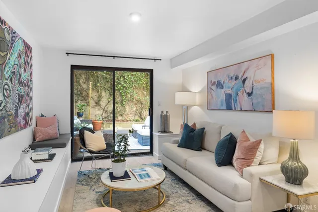 a city street lined with buildings and cars