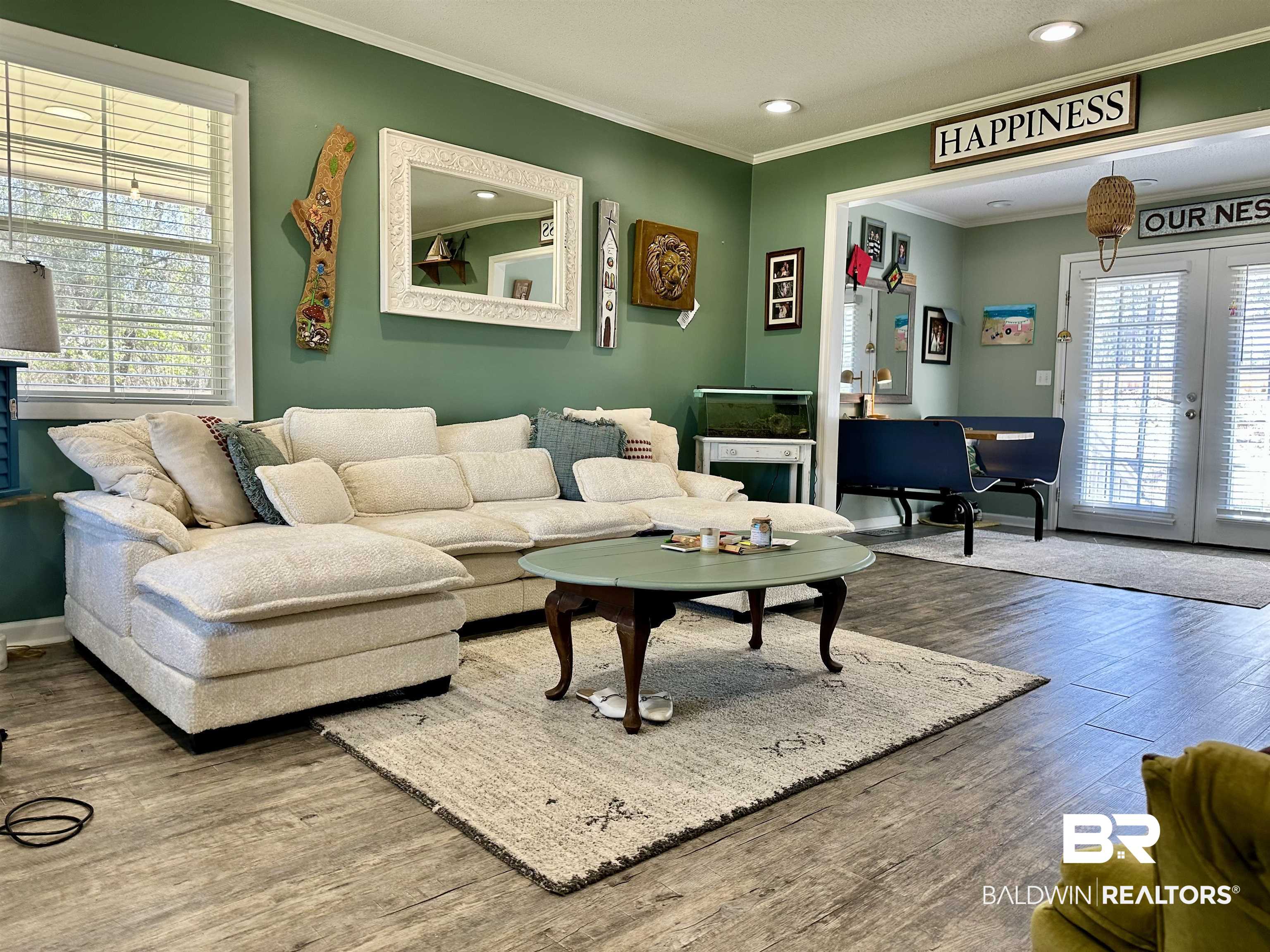 120 McGougin Road Brewton, AL 36426 - Photo 9 of 21 Living room featuring baseboards, ornamental molding, wood finished floors, french doors, and recessed lighting