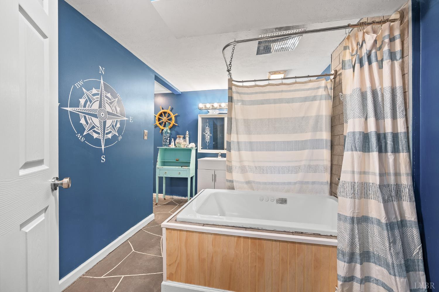 969 Hawkins Road Evington, VA 24550 - Photo 29 of 40 downstairs full bath. Jacuzzi tub with shower ring