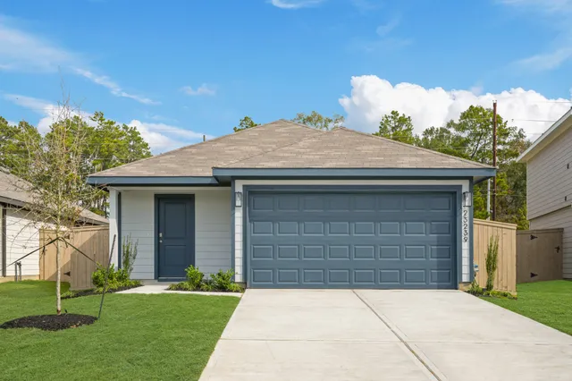 a front view of house with yard