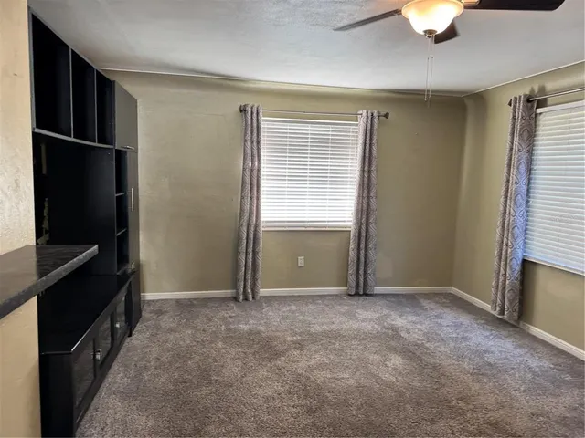 a view of a yard in front of house