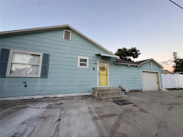a house view with a garden space