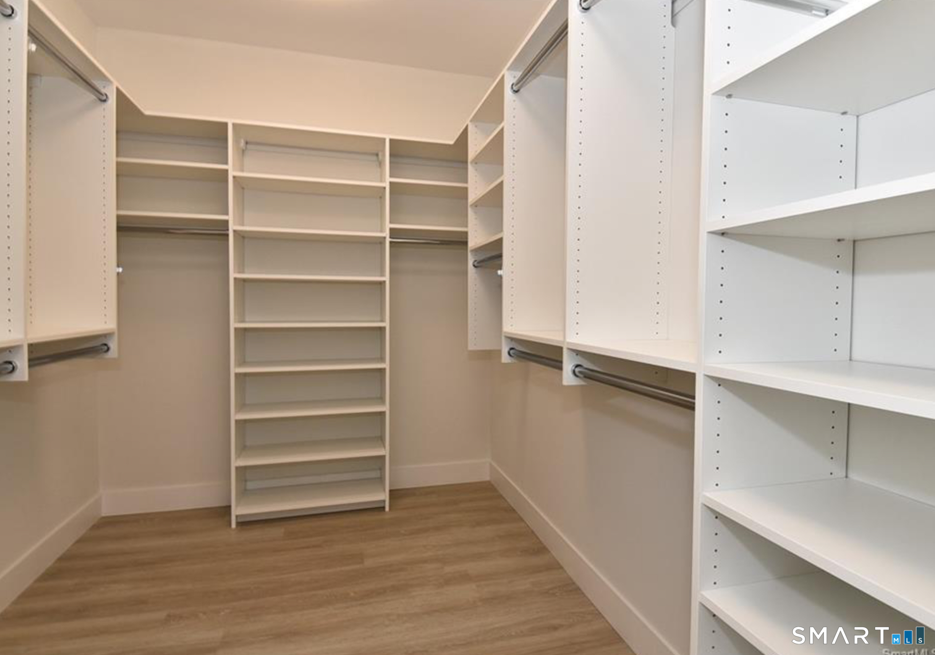 40 Fullin Road, Unit 19 Norwalk, CT 06851 - Photo 13 of 24 a view of walk in closet with empty racks