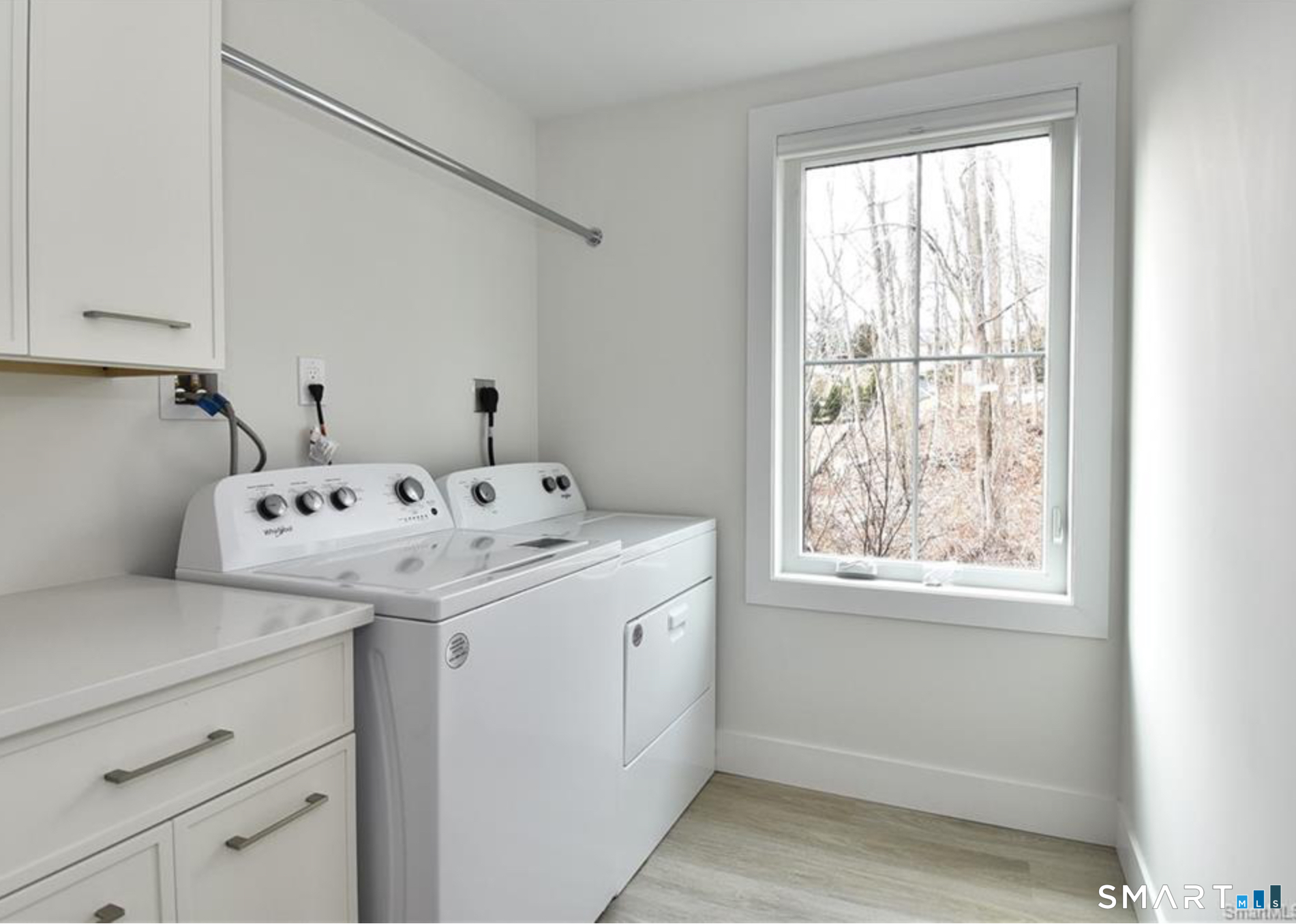 40 Fullin Road, Unit 19 Norwalk, CT 06851 - Photo 14 of 24 a utility room with a window dryer and washer