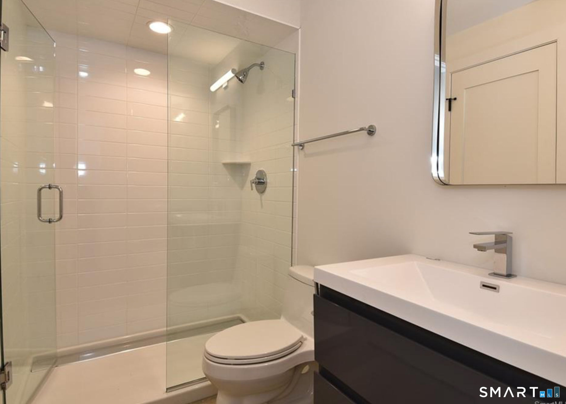 40 Fullin Road, Unit 19 Norwalk, CT 06851 - Photo 20 of 24 a bathroom with a sink toilet and shower