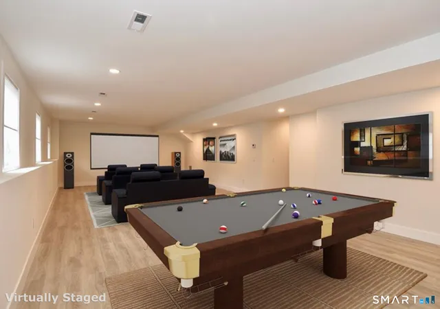 a view of kitchen with a table and chairs