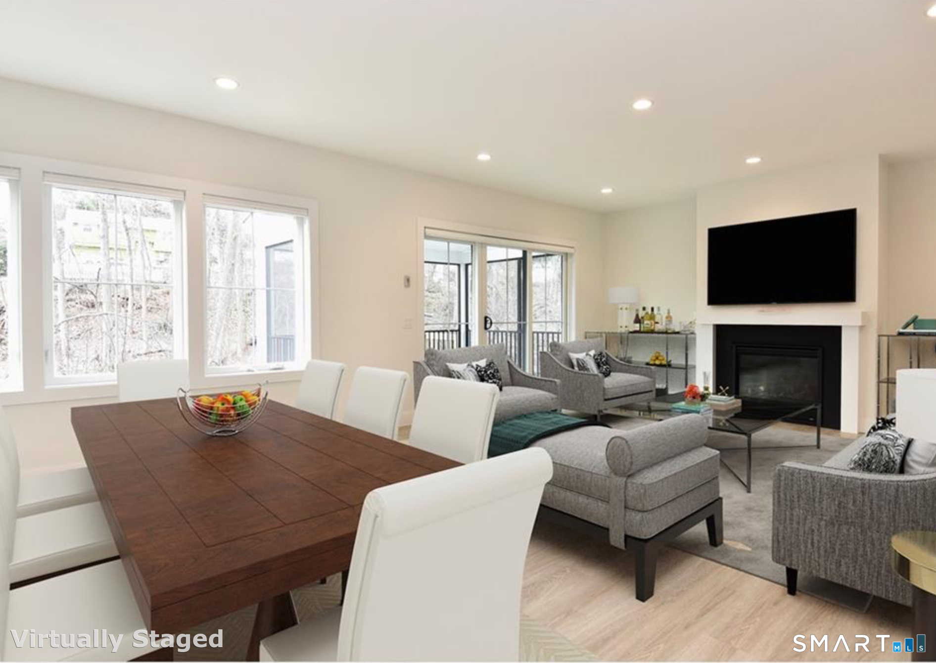 40 Fullin Road, Unit 19 Norwalk, CT 06851 - Photo 8 of 24 a living room with furniture a flat screen tv and a fireplace