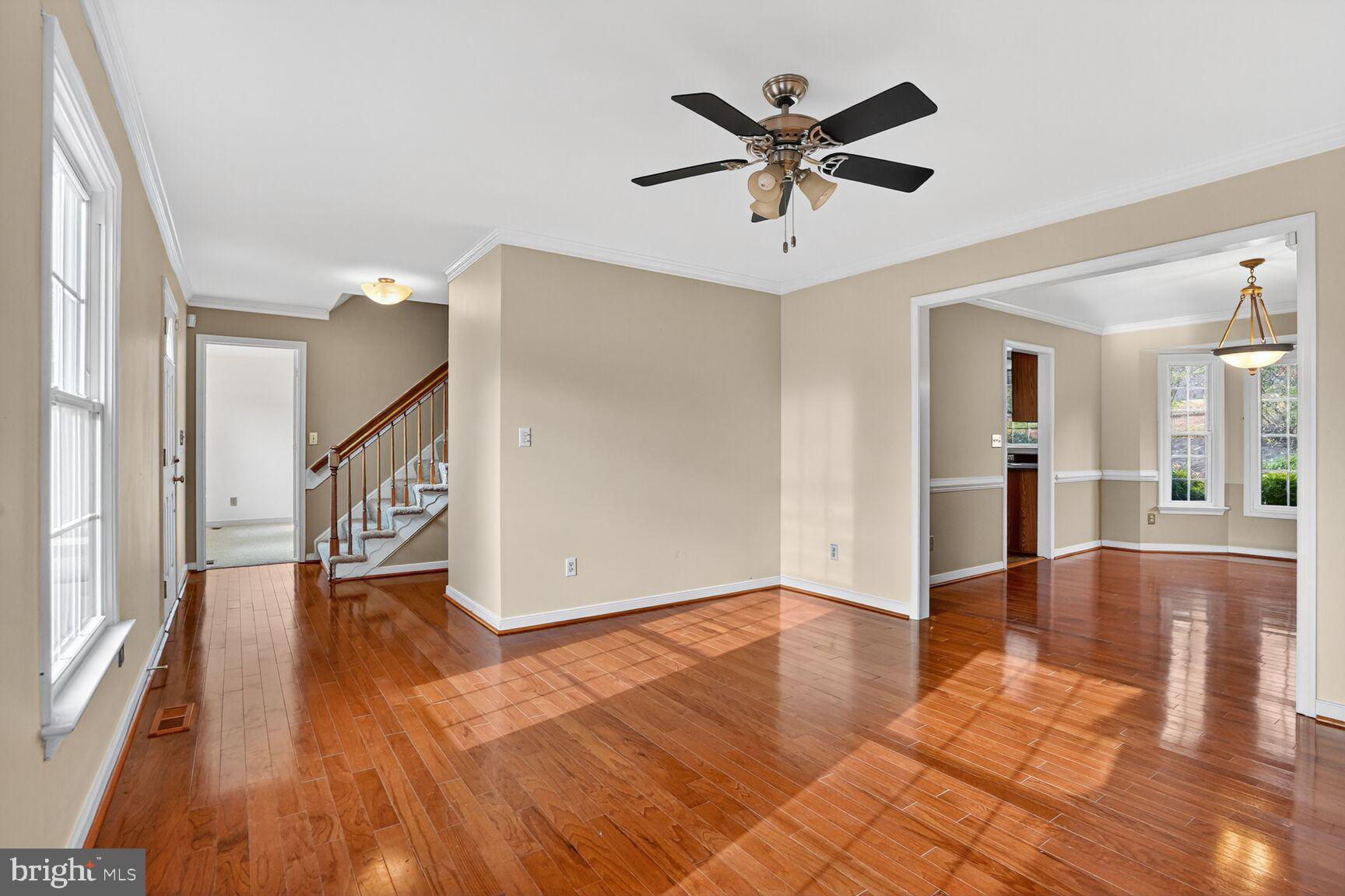 2008 State Stafford, VA 22554 - Photo 12 of 34 a view of a livingroom with wooden floor and a ceiling fan