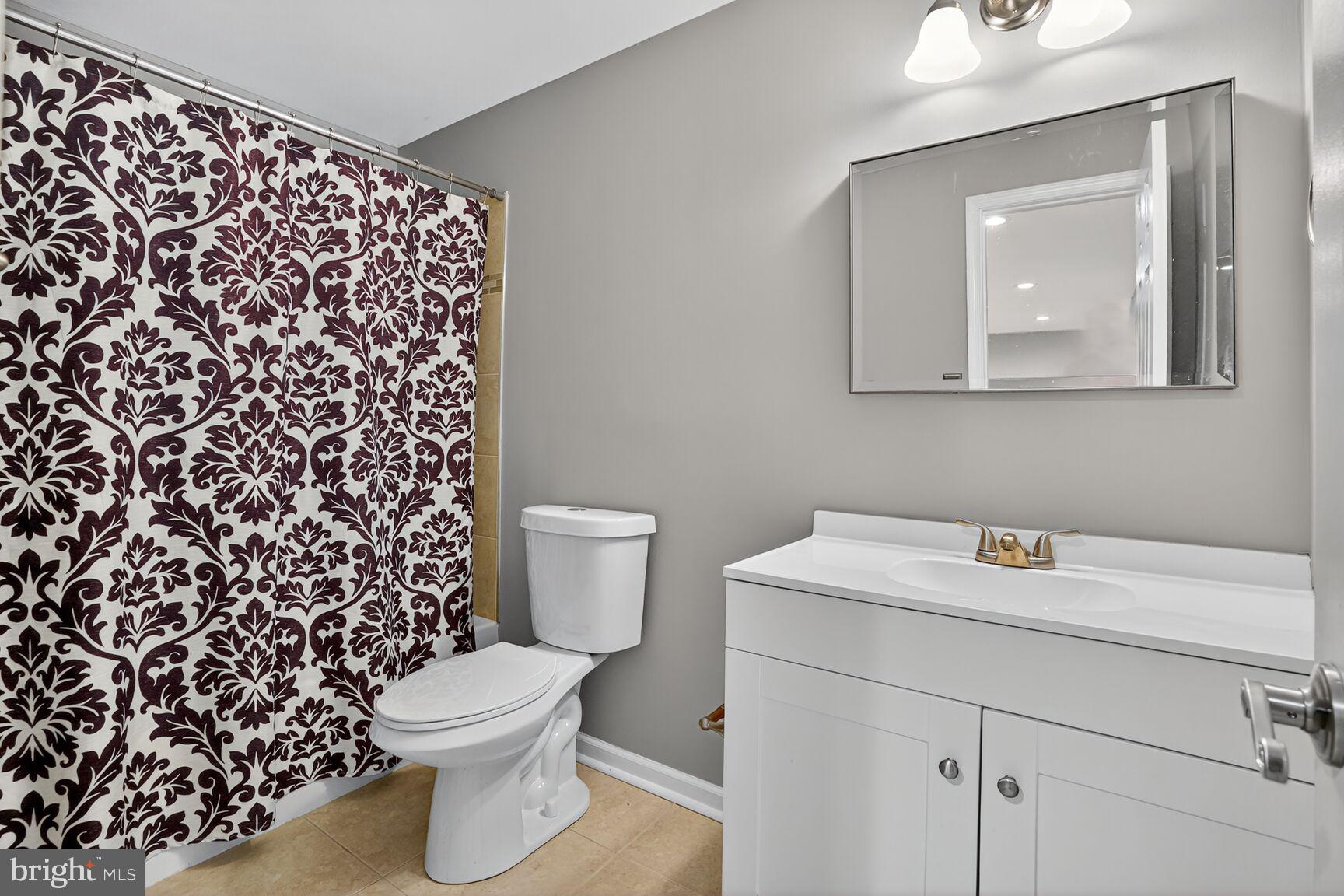 2008 State Stafford, VA 22554 - Photo 25 of 34 a bathroom with a toilet and a mirror