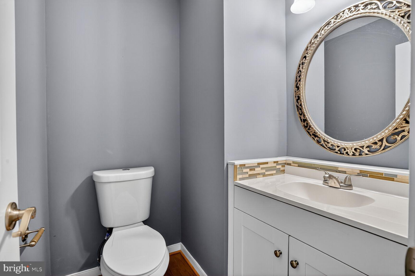 2008 State Stafford, VA 22554 - Photo 4 of 34 a bathroom with a toilet sink and mirror