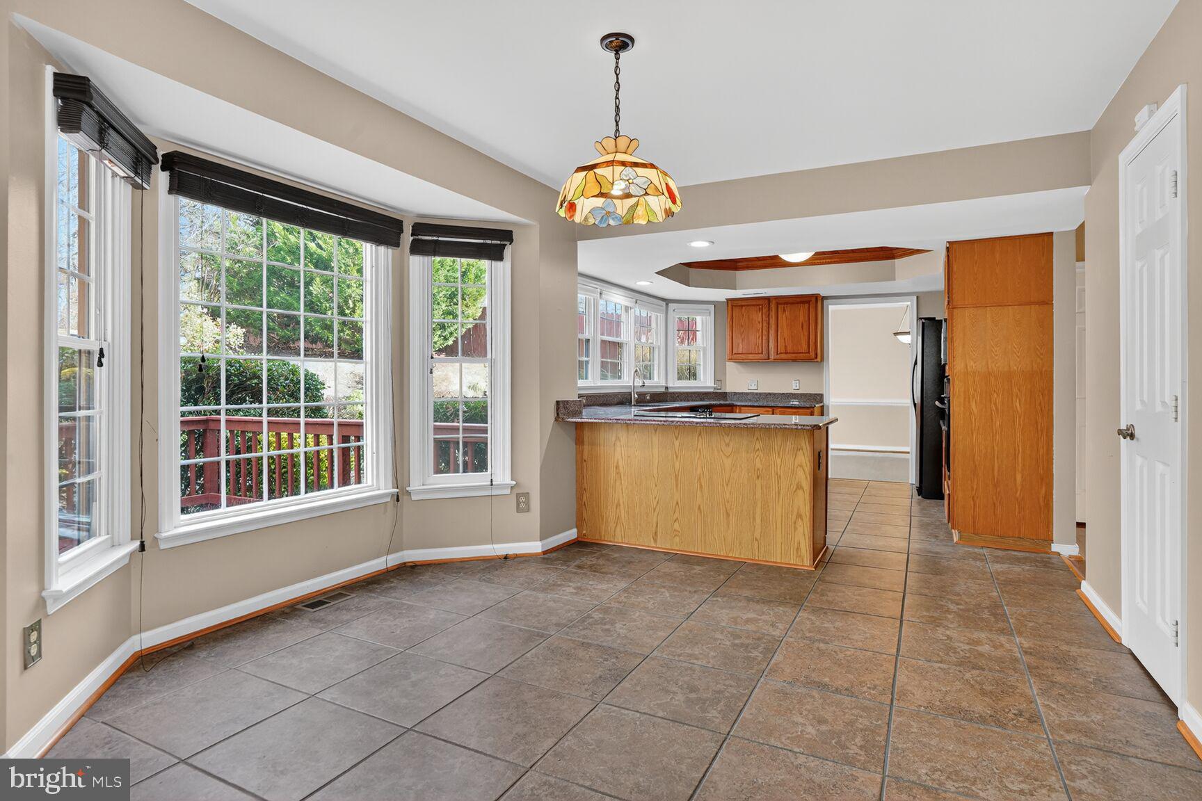 2008 State Stafford, VA 22554 - Photo 7 of 34 a kitchen with granite countertop a stove a sink and a refrigerator