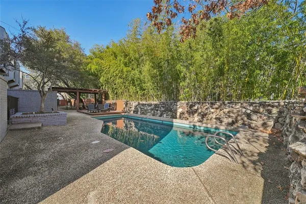 a view of a backyard with a garden