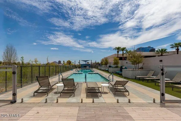 a view of roof deck with patio