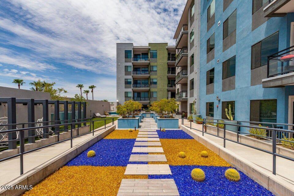 3131 North Central Avenue, Unit 7004 Phoenix, AZ 85012 - Photo 21 of 26 a view of swimming pool with outdoor seating