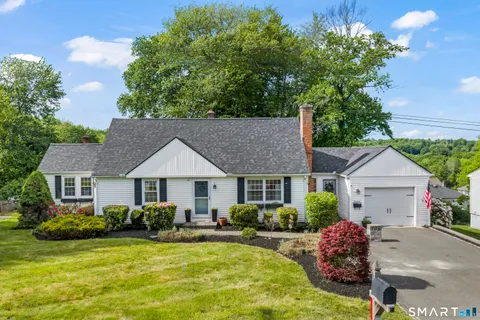 a house view with a garden space