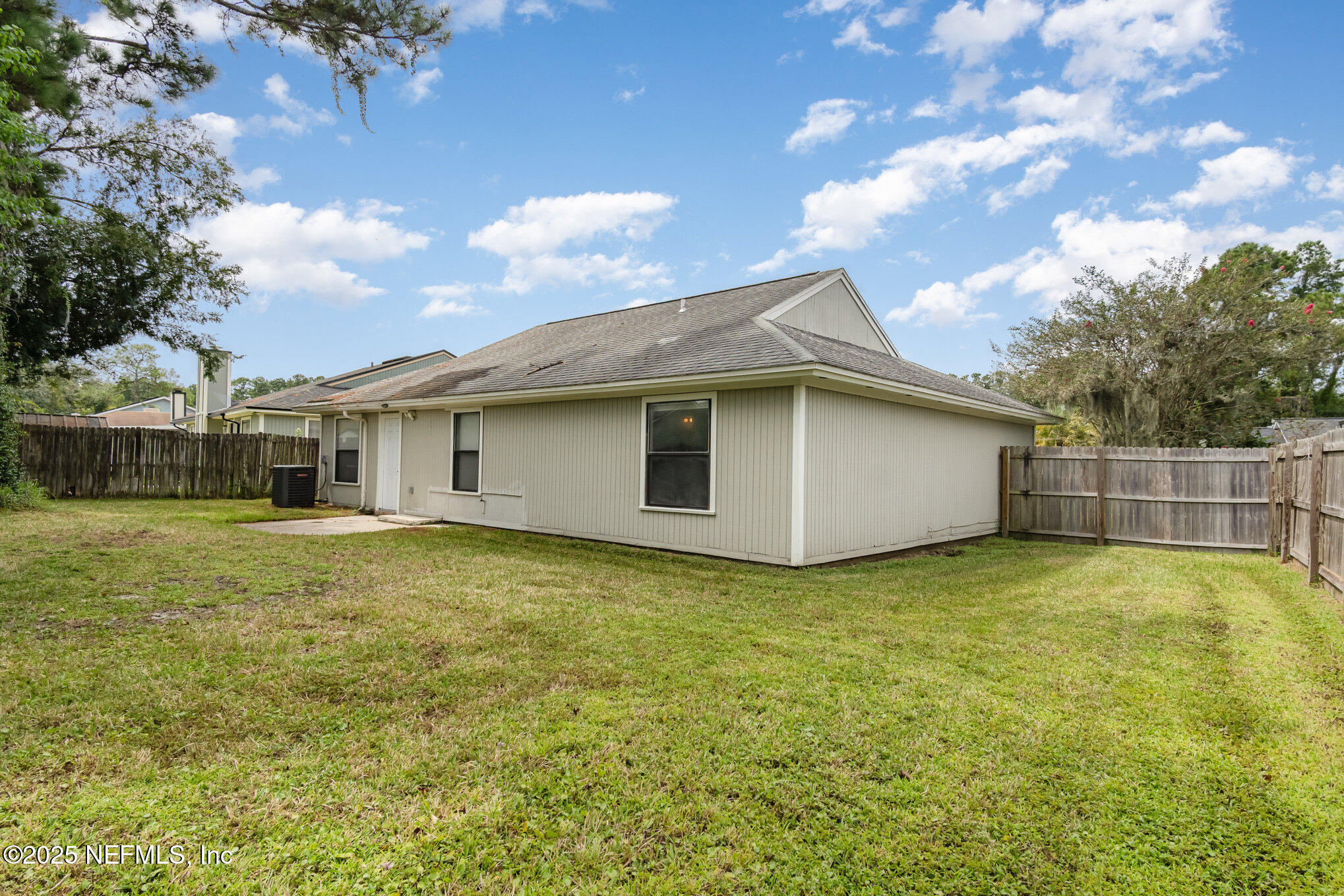 7945 Amandas Crossing Drive East Jacksonville, FL 32244 - Photo 15 of 15 a view of a house with a backyard