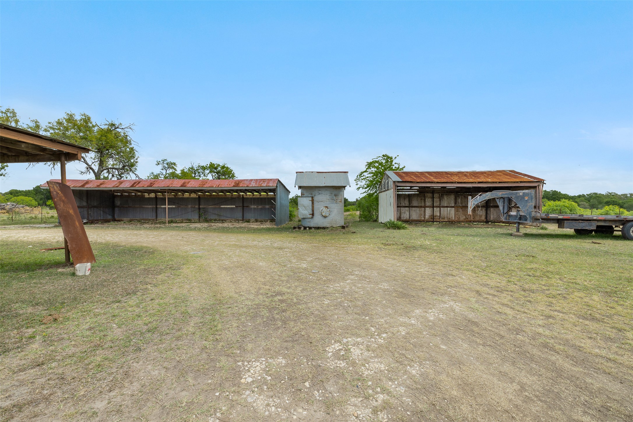 9765 State Park Road Lockhart, TX 78644 - Photo 19 of 40 a view of house with outdoor space and sitting area