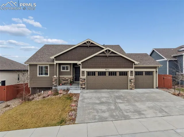 a front view of a house with yard