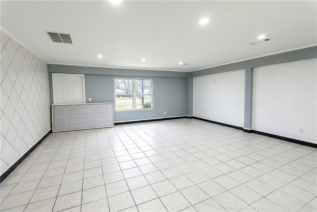 706 Collins Hill Road Lawrenceville, GA 30046 - Photo 8 of 33 an empty room with windows