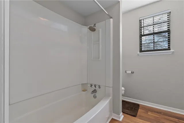 a outdoor space with lots of furniture and tub