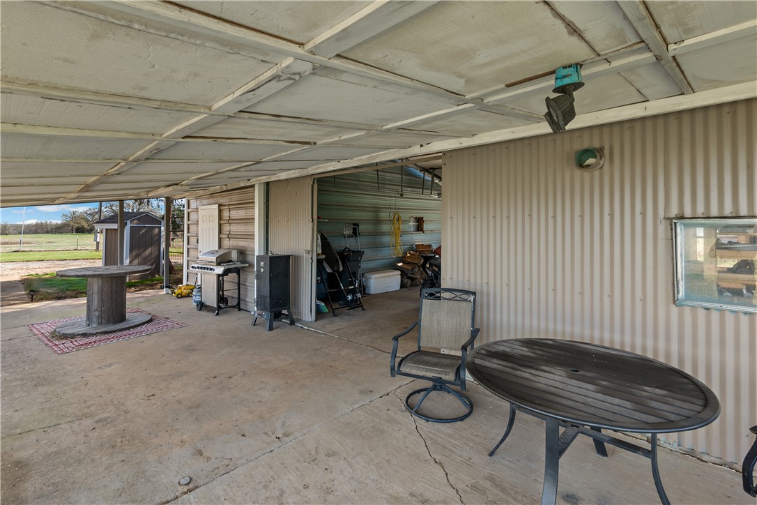 9269 Wheelock Hall Road Hearne, TX 77859 - Photo 21 of 25 a room with gym equipment and a table