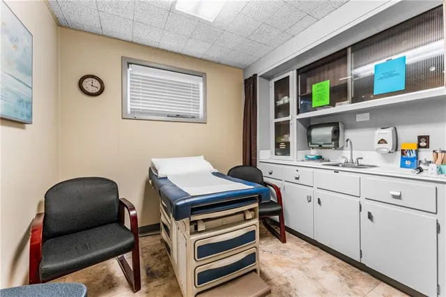 a room with furniture and a window