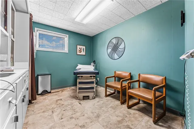 a view of a workspace with furniture