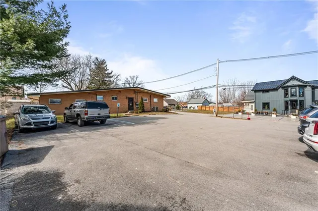 a view of street with parked cars