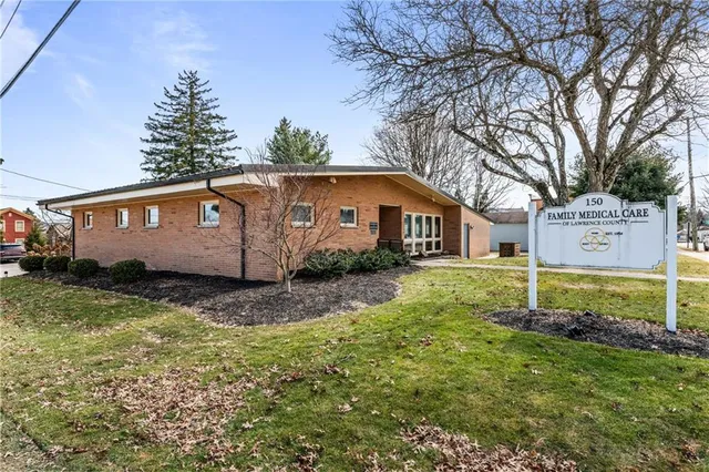 a house view with a garden space