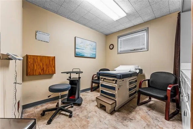 a room with furniture and a rug