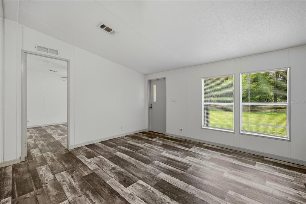 4950 80 Street Chiefland, FL 32626 - Photo 10 of 68 a view of an empty room with a window