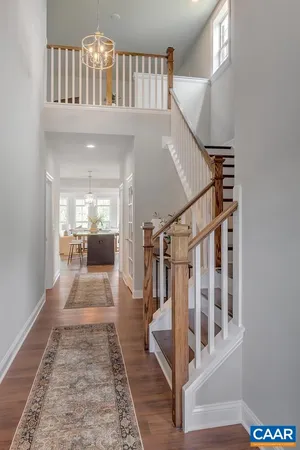 a view of entryway and hall with dining area