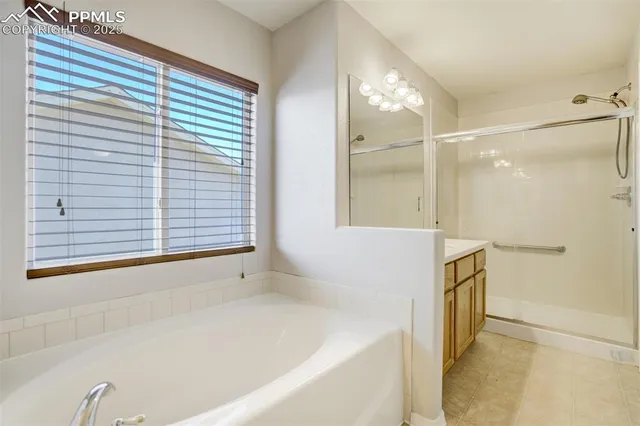 a bedroom with furniture and wooden floor