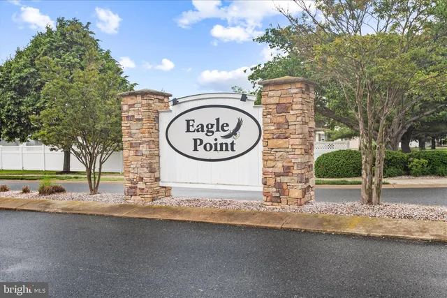 a sign on a pole on a street