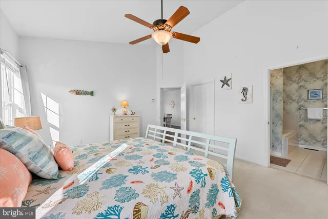 a bedroom with a bed and dresser