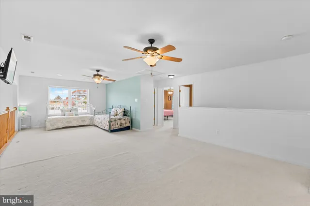 a bathroom with a shower curtain and a curtain