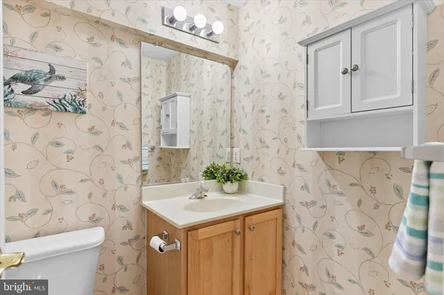 a front view of a house with backyard and sitting area