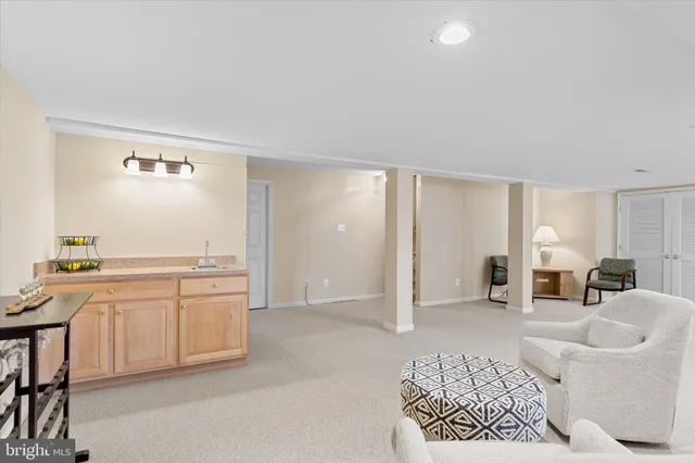 a view of a swimming pool with lawn chairs