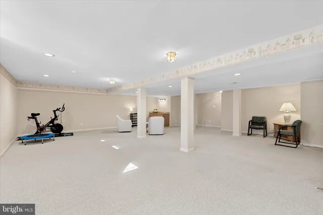 a view of a swimming pool with sitting space