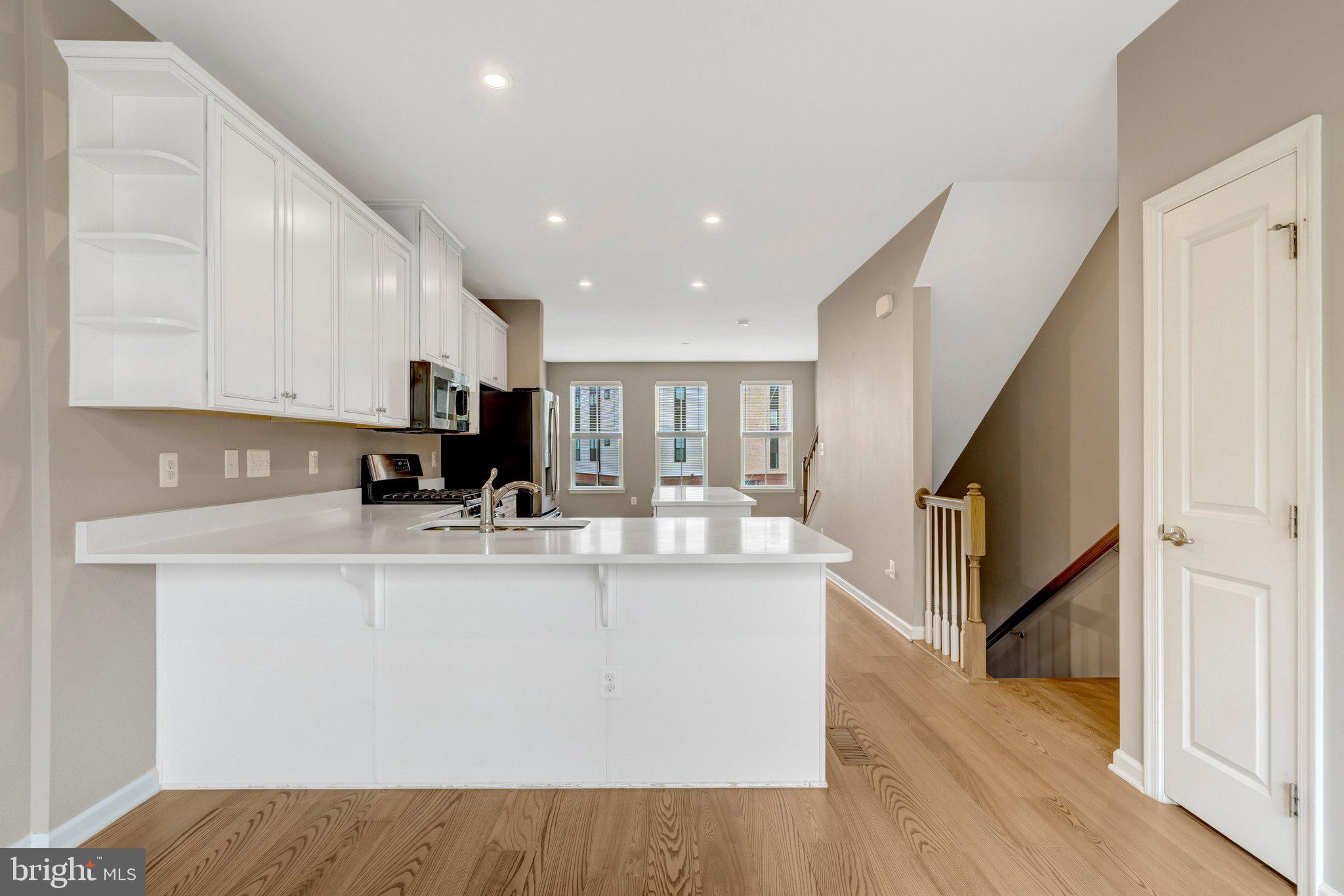 43406 Old Ryan Road Ashburn, VA 20148 - Photo 2 of 62 Gorgeous kitchen has this peninsula for seating