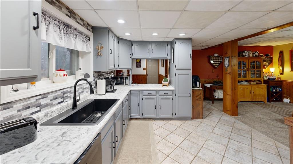 174 Rose Lane Rimersburg, PA 16248 - Photo 15 of 34 a kitchen with stainless steel appliances granite countertop a sink and cabinets