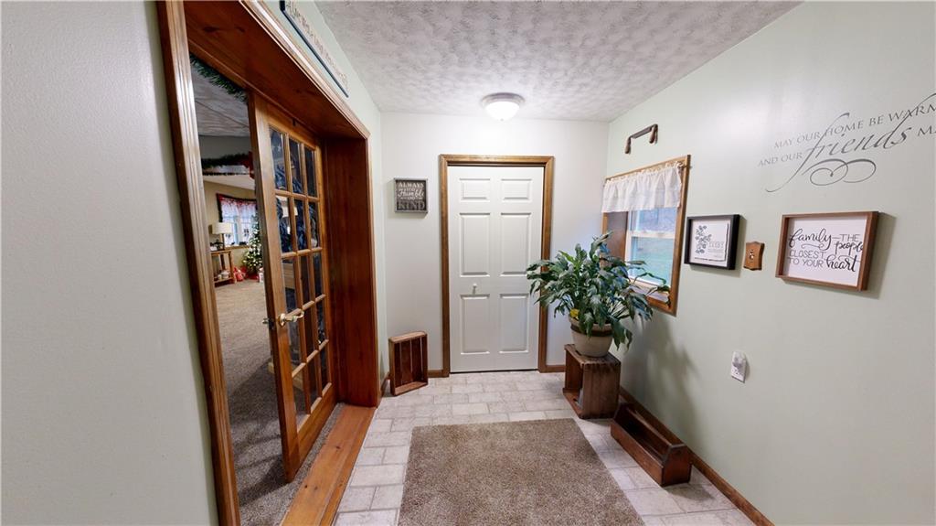 174 Rose Lane Rimersburg, PA 16248 - Photo 21 of 34 a view of a hallway with paintings on the wall
