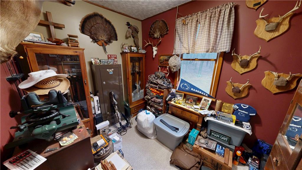 174 Rose Lane Rimersburg, PA 16248 - Photo 25 of 34 walk in closet with clothes and shoes