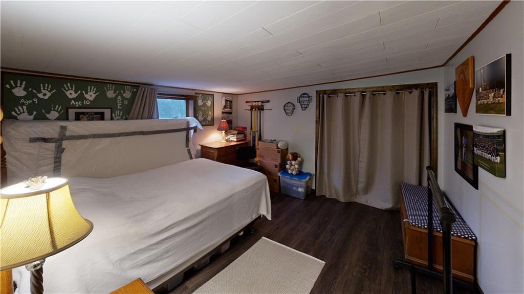 174 Rose Lane Rimersburg, PA 16248 - Photo 28 of 34 a bed room with a bed window and a television