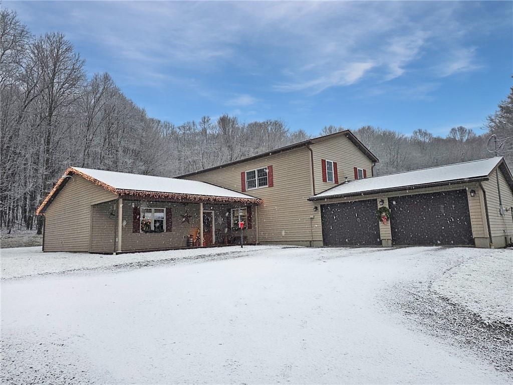 174 Rose Lane Rimersburg, PA 16248 - Photo 7 of 34 a front view of house with yard and covered with trees