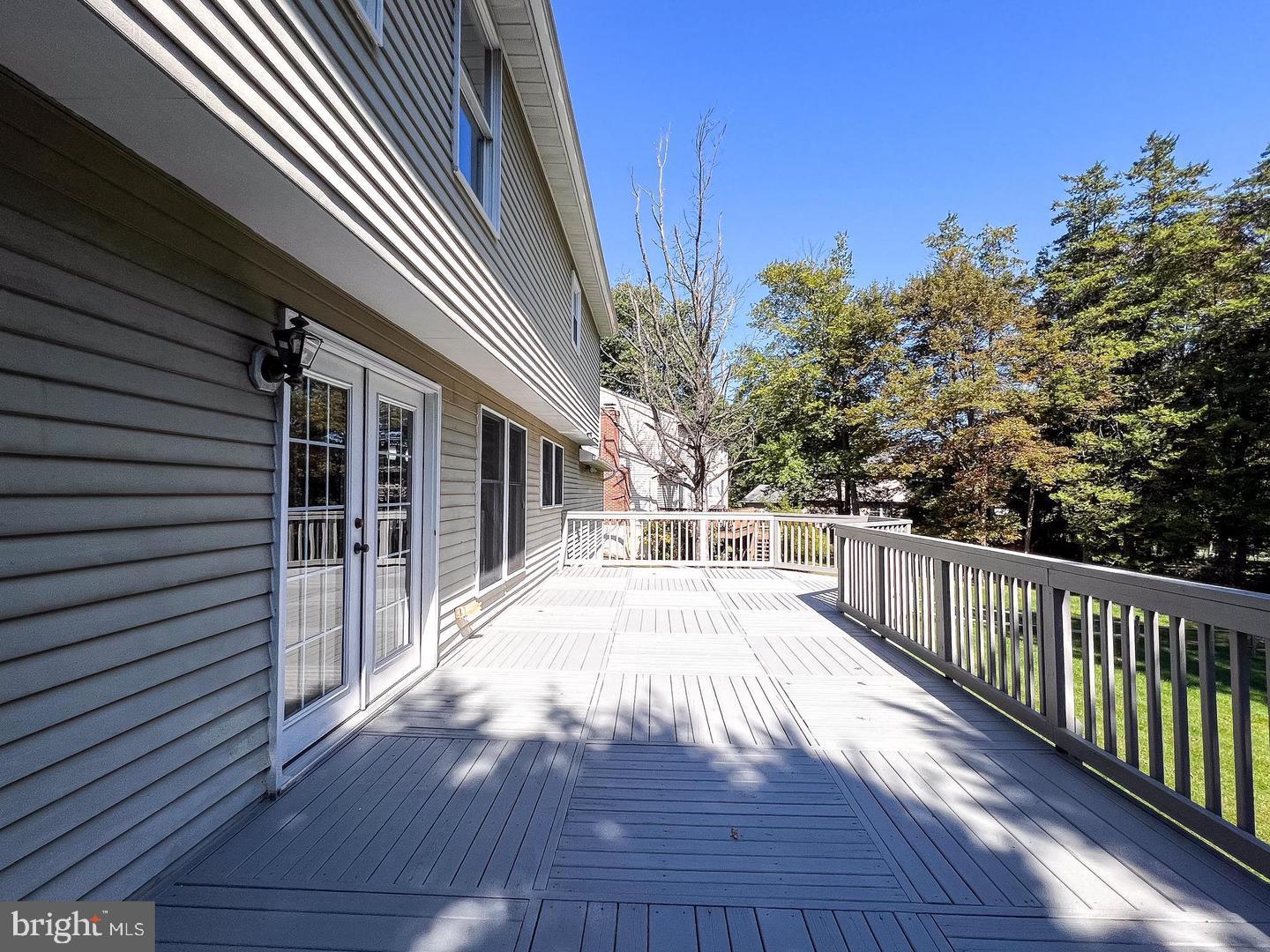 14913 Lear Lane Silver Spring, MD 20905 - Photo 9 of 33 Spacious deck with serene views.