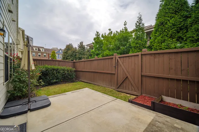 a backyard of a house with lots of green space