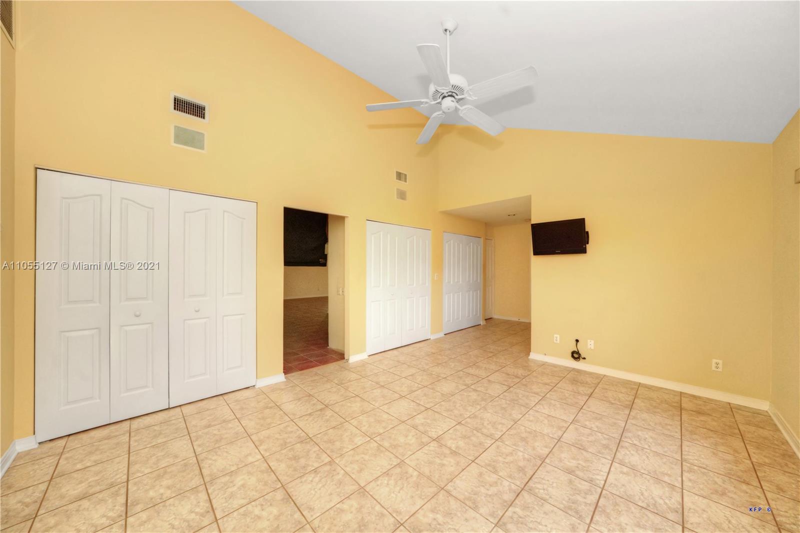 540 Southwest Salerno Road Stuart, FL 34997 - Photo 11 of 44 a view of an empty room with chandelier fan
